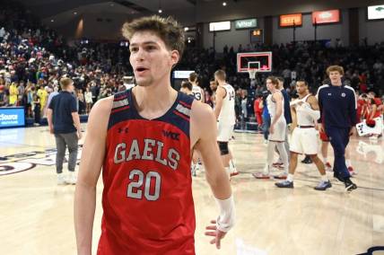 Feb 3, 2024; Spokane, Washington, USA; St. Mary's Gaels guard Aidan Mahaney (20) celebrates after a game against the Gonzaga Bulldogs in the second half at McCarthey Athletic Center. St. Mary's Gaels won 64-62. Mandatory Credit: James Snook-USA TODAY Sports