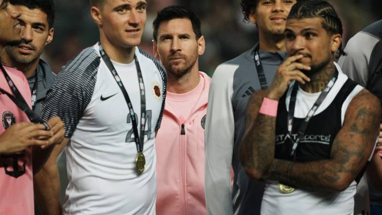 [US, Mexico & Canada customers only] Feb 4, 2024; Hong Kong, HONG KONG; Inter Miami players Lionel Messi, Julian Gressel, Luis Suarez and DeAndre Yedlin during the trophy presentation after a preseason friendly soccer match against Hong Kong XI at Hong Kong Stadium. Mandatory Credit: Lam Yik/Reuters via USA TODAY Sports