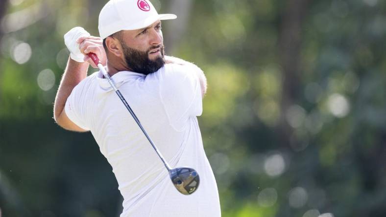 Feb 4, 2024; Playa del Carmen, Quintana Roo, MEX; Jon Rahm of Team Legion XIII tees off on #7 during the final round of the LIV Golf Mayakoba tournament at El Chamaleon Golf Course. Mandatory Credit: Erich Schlegel-USA TODAY Sports