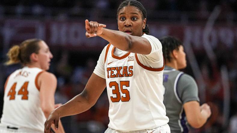 Texas Longhorns guard Madison Booker (35) directs her team during the basketball game against Kansas State at the Moody Center on Sunday, Feb. 4, 2024 in Austin.