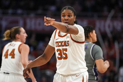 Texas Longhorns guard Madison Booker (35) directs her team during the basketball game against Kansas State at the Moody Center on Sunday, Feb. 4, 2024 in Austin.