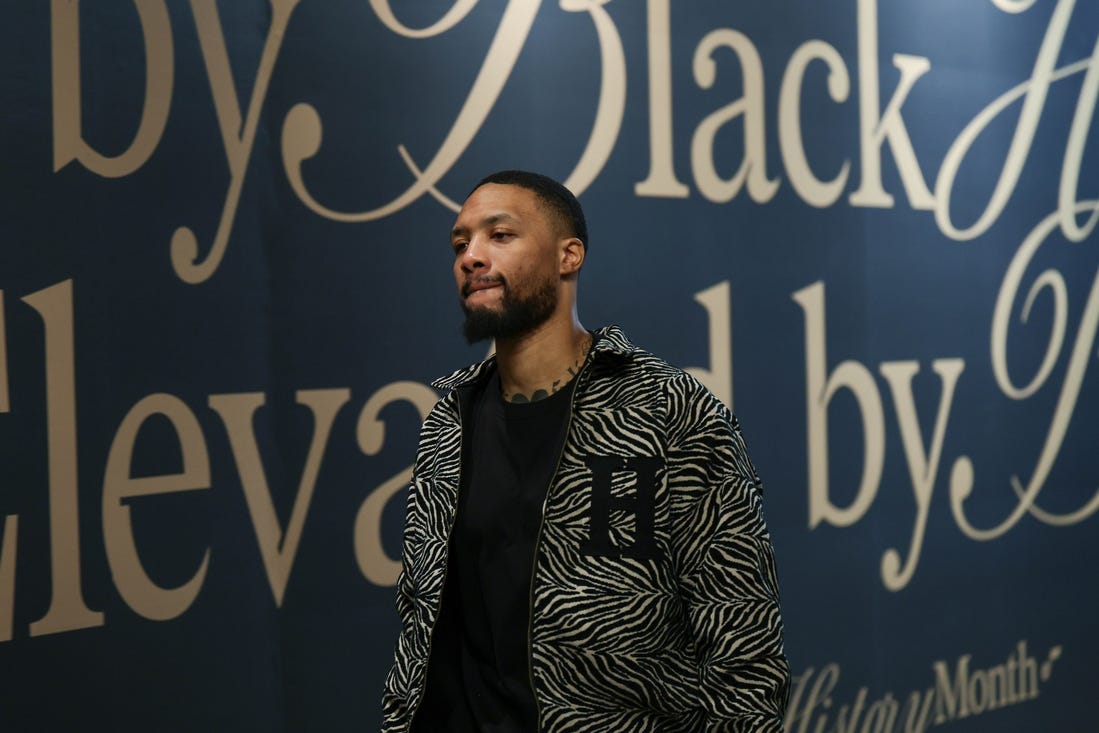 Feb 4, 2024; Salt Lake City, Utah, USA;  Milwaukee Bucks guard Damian Lillard (0) arrives at the Delta Center before the game against the Utah Jazz. Mandatory Credit: Chris Nicoll-USA TODAY Sports