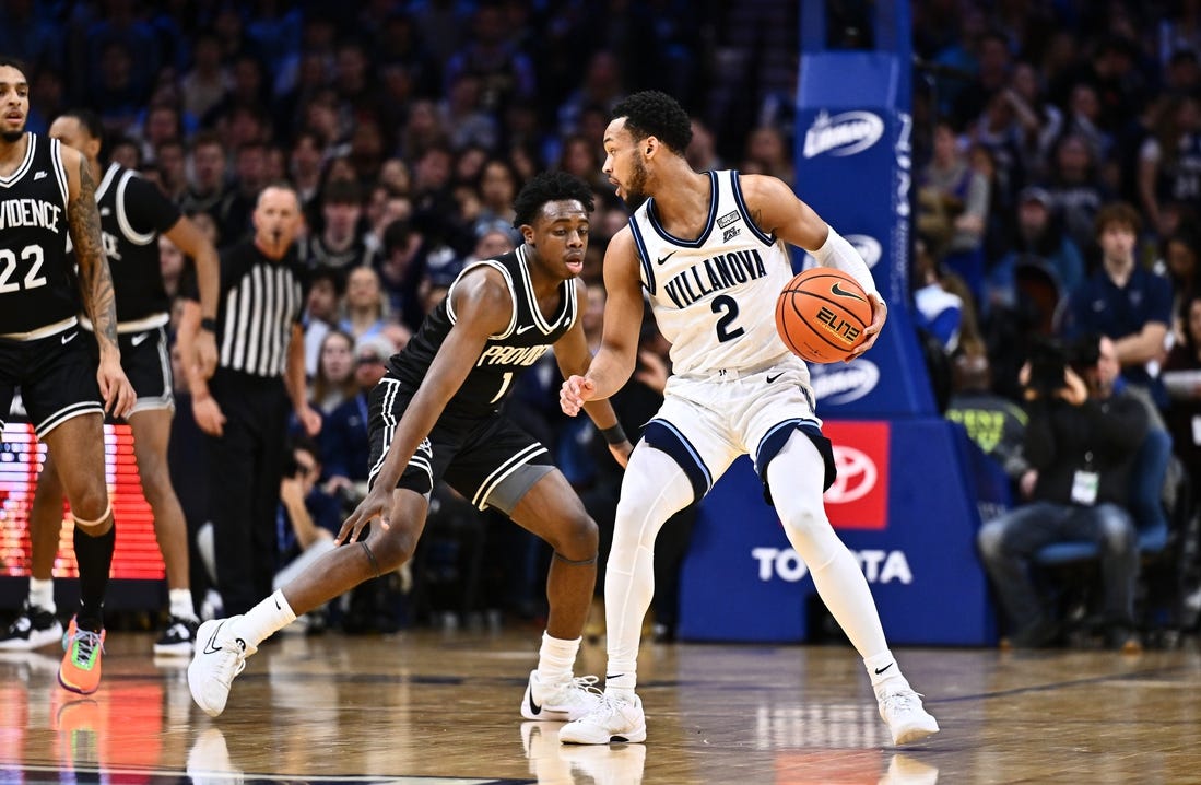 Feb 4, 2024; Philadelphia, Pennsylvania, USA; Villanova Wildcats guard Mark Armstrong (2) controls the ball against Providence Friars guard Jayden Pierre (1) in the first half at Wells Fargo Center. Mandatory Credit: Kyle Ross-USA TODAY Sports