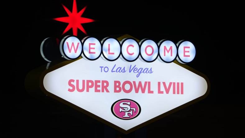 Feb 4, 2024; Las Vegas, NV, USA; A Welcome to Las Vegas Super Bowl LVIII sign with San Francisco 49ers logo at the Harry Reid International Airport. Mandatory Credit: Kirby Lee-USA TODAY Sports