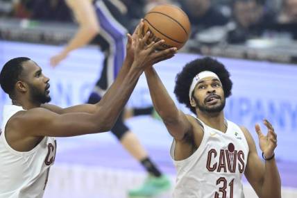 Feb 5, 2024; Cleveland, Ohio, USA; Cleveland Cavaliers center Jarrett Allen (31) rebounds beside forward Evan Mobley (4) in the first quarter against the Sacramento Kings at Rocket Mortgage FieldHouse. Mandatory Credit: David Richard-USA TODAY Sports