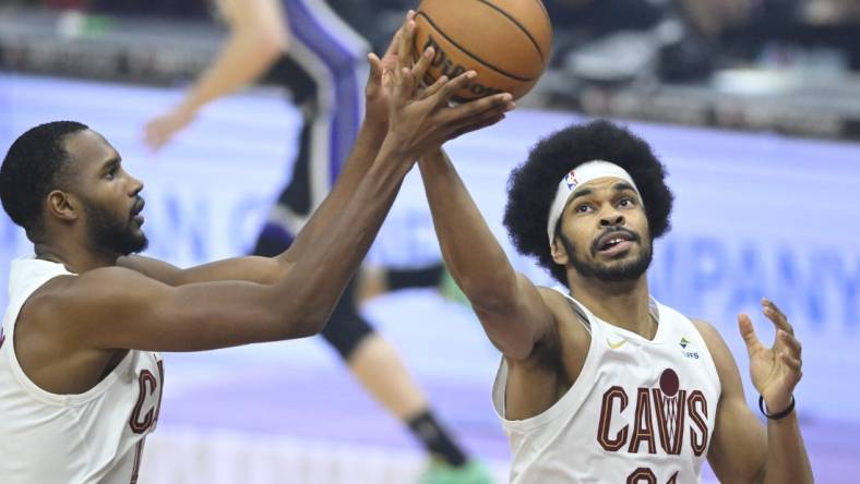 Feb 5, 2024; Cleveland, Ohio, USA; Cleveland Cavaliers center Jarrett Allen (31) rebounds beside forward Evan Mobley (4) in the first quarter against the Sacramento Kings at Rocket Mortgage FieldHouse. Mandatory Credit: David Richard-USA TODAY Sports