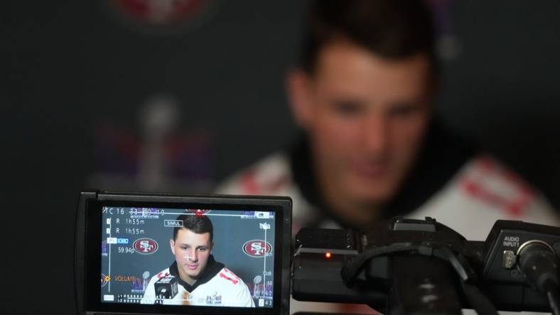 Feb 6, 2024; Las Vegas, NV, USA; San Francisco 49ers quarterback Brock Purdy (13) is interviewed during a press conference before Super Bowl LVIII at the Hilton Lake Las Vegas Resort. Mandatory Credit: Kirby Lee-USA TODAY Sports