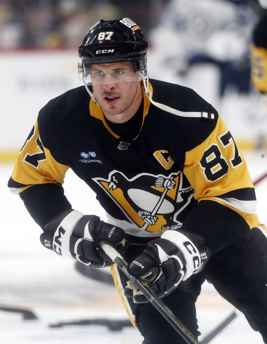 Feb 6, 2024; Pittsburgh, Pennsylvania, USA;  Pittsburgh Penguins center Sidney Crosby (87) warms up before the game against the Winnipeg Jets at PPG Paints Arena. Mandatory Credit: Charles LeClaire-USA TODAY Sports