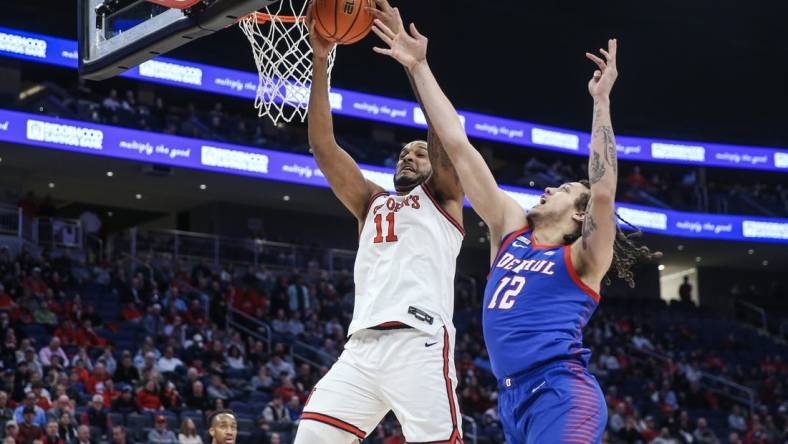 Feb 6, 2024; Elmont, New York, USA; St. John's Red Storm center Joel Soriano (11) and DePaul Blue Demons forward Mac Etienne (12) fight for a rebound in the first half at UBS Arena. Mandatory Credit: Wendell Cruz-USA TODAY Sports