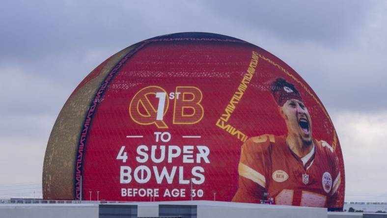 February 6, 2024; Las Vegas, NV, USA;  Kansas City Chiefs quarterback Patrick Mahomes is displayed on Super Bowl LVIII signage on The Sphere. Mandatory Credit: Kyle Terada-USA TODAY Sports