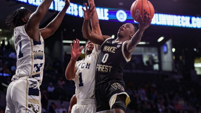 Feb 6, 2024; Atlanta, Georgia, USA; Wake Forest Demon Deacons guard Kevin Miller (0) shoots against the Georgia Tech Yellow Jackets in the first half at McCamish Pavilion. Mandatory Credit: Brett Davis-USA TODAY Sports