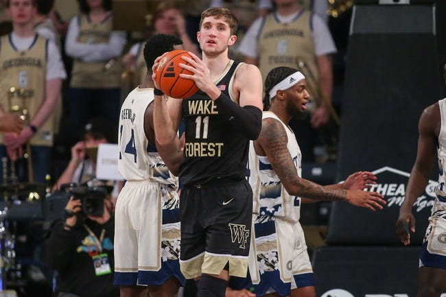 Feb 6, 2024; Atlanta, Georgia, USA; Wake Forest Demon Deacons forward Andrew Carr (11) grabs the ball against the Georgia Tech Yellow Jackets in the second half at McCamish Pavilion. Mandatory Credit: Brett Davis-USA TODAY Sports