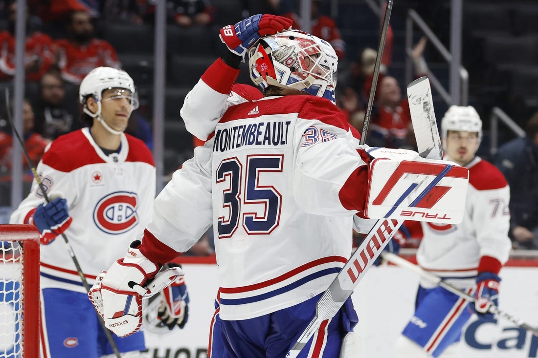Feb 6, 2024; Washington, District of Columbia, USA; Montreal Canadiens goaltender Sam Montembeault (35) celebrates with teammates after their game against the Washington Capitals at Capital One Arena. Mandatory Credit: Geoff Burke-USA TODAY Sports