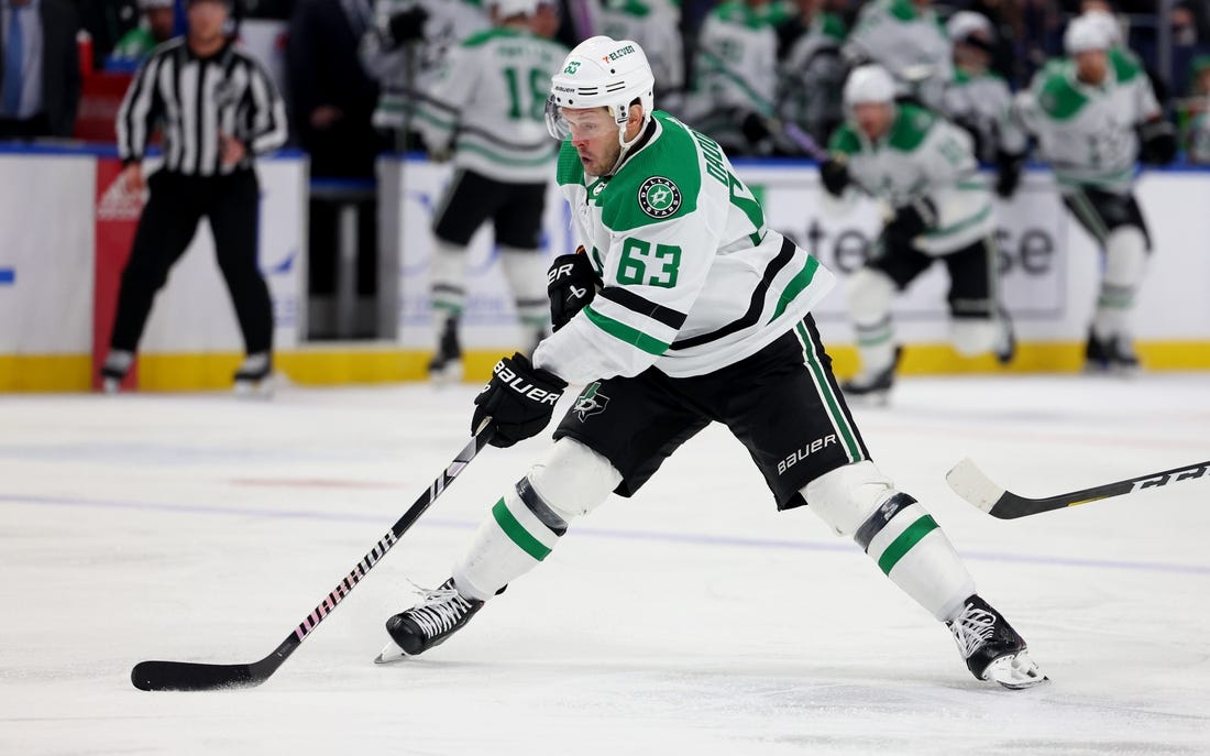 Feb 6, 2024; Buffalo, New York, USA;  Dallas Stars right wing Evgenii Dadonov (63) skates with the puck during the third period against the Buffalo Sabres at KeyBank Center. Mandatory Credit: Timothy T. Ludwig-USA TODAY Sports