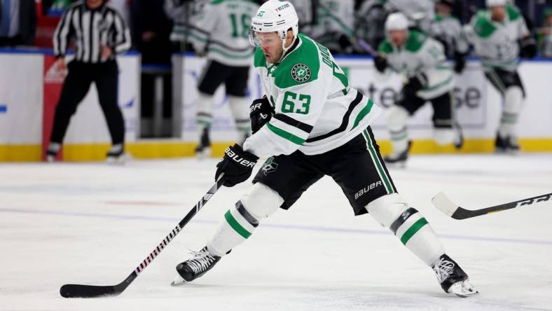 Feb 6, 2024; Buffalo, New York, USA;  Dallas Stars right wing Evgenii Dadonov (63) skates with the puck during the third period against the Buffalo Sabres at KeyBank Center. Mandatory Credit: Timothy T. Ludwig-USA TODAY Sports