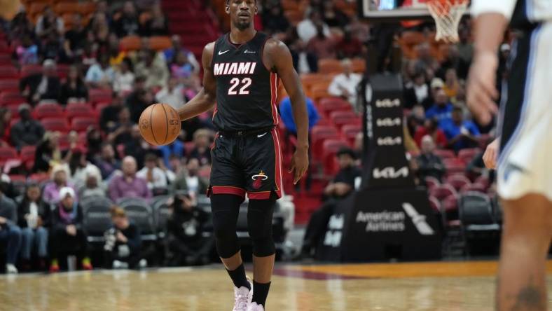 Feb 6, 2024; Miami, Florida, USA;  Miami Heat forward Jimmy Butler (22) brings the ball up the court against the Orlando Magic during the first half at Kaseya Center. Mandatory Credit: Jim Rassol-USA TODAY Sports