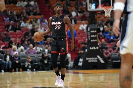 Feb 6, 2024; Miami, Florida, USA;  Miami Heat forward Jimmy Butler (22) brings the ball up the court against the Orlando Magic during the first half at Kaseya Center. Mandatory Credit: Jim Rassol-USA TODAY Sports