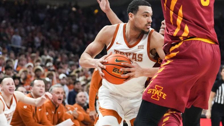 Texas Longhorns forward Dylan Disu (1) looks to pass to a teammate during the game against Iowa State at the Moody center in Austin, Texas Tuesday, Feb. 6, 2024.