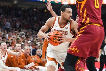 Texas Longhorns forward Dylan Disu (1) looks to pass to a teammate during the game against Iowa State at the Moody center in Austin, Texas Tuesday, Feb. 6, 2024.