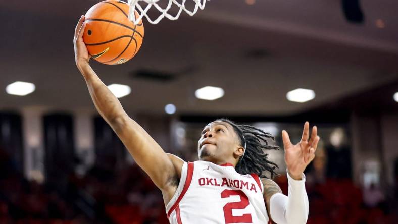 Oklahoma guard Javian McCollum (2) lays up the ball in the second half during an NCAA basketball game between University of Oklahoma (OU) and Brigham Young University (BYU) at Lloyd Noble Center in Norman, Okla., on Tuesday, Feb. 6, 2024.