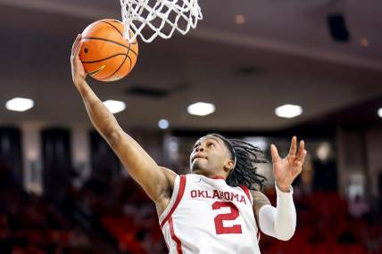 Oklahoma guard Javian McCollum (2) lays up the ball in the second half during an NCAA basketball game between University of Oklahoma (OU) and Brigham Young University (BYU) at Lloyd Noble Center in Norman, Okla., on Tuesday, Feb. 6, 2024.