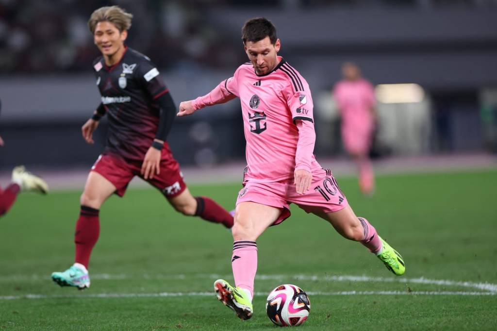 Feb 7, 2024; Tokyo, Japan; Inter Miami CF forward Lionel Messi (10) shoots against Vissel Kobe during the second half of a preseason friendly at Japan National Stadium. Mandatory Credit: Naoki Nishimura-USA TODAY Sports