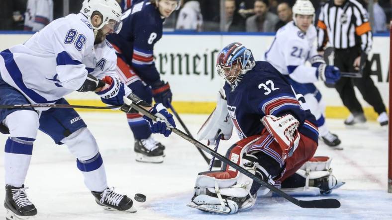 Feb 7, 2024; New York, New York, USA; New York Rangers goaltender Jonathan Quick (32) defends the net against Tampa Bay Lightning right wing Nikita Kucherov (86) in the first period at Madison Square Garden. Mandatory Credit: Wendell Cruz-USA TODAY Sports