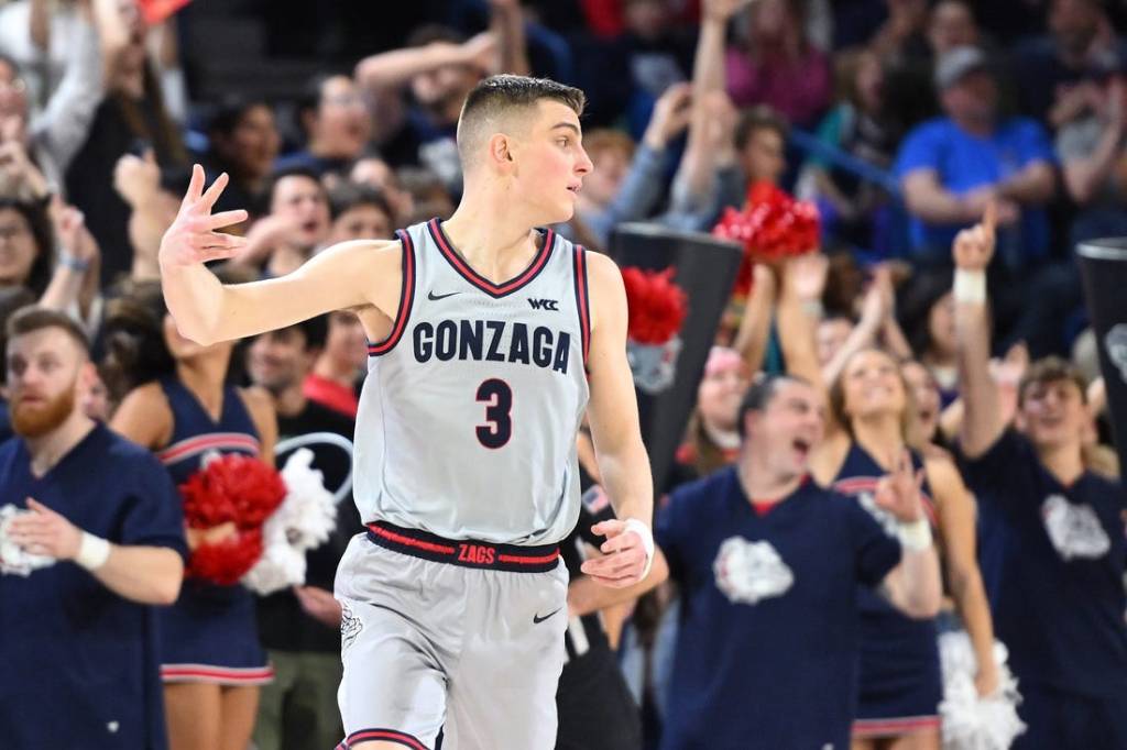 Feb 7, 2024; Spokane, Washington, USA; Gonzaga Bulldogs guard Luka Krajnovic (3) celebrates a three-pointer against the Portland Pilots in the second half at McCarthey Athletic Center. Gonzaga Bulldogs won 96-64. Mandatory Credit: James Snook-USA TODAY Sports