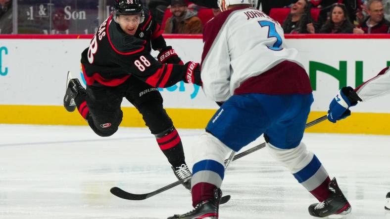 Feb 8, 2024; Raleigh, North Carolina, USA; Carolina Hurricanes center Martin Necas (88) scores a goal against the Colorado Avalanche during the first period at PNC Arena. Mandatory Credit: James Guillory-USA TODAY Sports