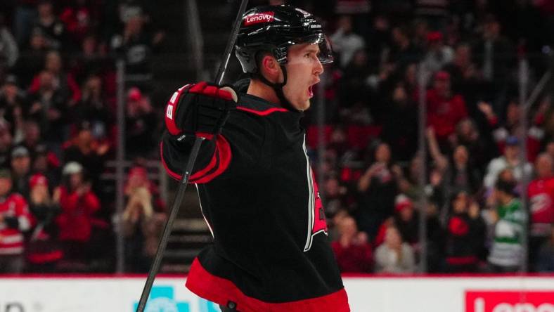 Feb 8, 2024; Raleigh, North Carolina, USA; Carolina Hurricanes center Martin Necas (88) scores a goal against the Colorado Avalanche during the first period at PNC Arena. Mandatory Credit: James Guillory-USA TODAY Sports