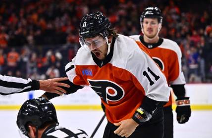 Feb 8, 2024; Philadelphia, Pennsylvania, USA; Philadelphia Flyers right wing Travis Konecny (11) reacts after a fight against Winnipeg Jets defenseman Neal Pionk (4) in the first period at Wells Fargo Center. Mandatory Credit: Kyle Ross-USA TODAY Sports