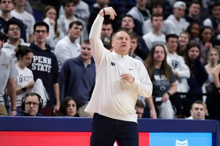 Feb 8, 2024; University Park, Pennsylvania, USA; Penn State Nittany Lions head coach Mike Rhoades gestures from the bench during the first half against the Iowa Hawkeyes at Bryce Jordan Center. Mandatory Credit: Matthew O'Haren-USA TODAY Sports