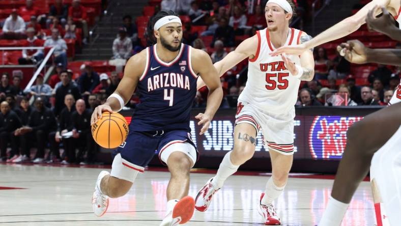 Feb 8, 2024; Salt Lake City, Utah, USA; Arizona Wildcats guard Kylan Boswell (4) brings the ball up the court against Utah Utes guard Gabe Madsen (55) during the first half at Jon M. Huntsman Center. Mandatory Credit: Rob Gray-USA TODAY Sports