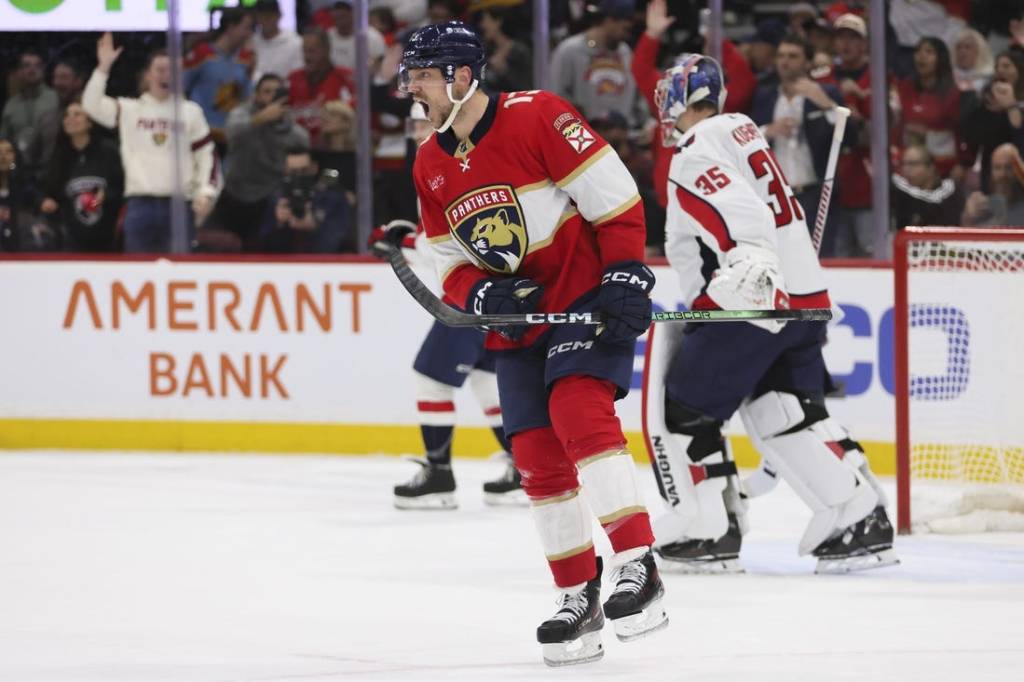 Feb 8, 2024; Sunrise, Florida, USA; Florida Panthers center Sam Reinhart (13) celebrates after scoring against the Washington Capitals during the second period at Amerant Bank Arena. Mandatory Credit: Sam Navarro-USA TODAY Sports