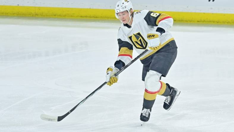 Feb 8, 2024; Tempe, Arizona, USA; Vegas Golden Knights defenseman Kaedan Korczak (6) passes the puck in the first period against the Arizona Coyotes at Mullett Arena. Mandatory Credit: Matt Kartozian-USA TODAY Sports