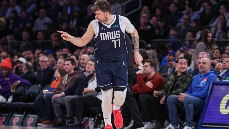 Feb 8, 2024; New York, New York, USA; Dallas Mavericks guard Luka Doncic (77) reacts after a basket against the New York Knicks during the second half at Madison Square Garden. Mandatory Credit: Vincent Carchietta-USA TODAY Sports