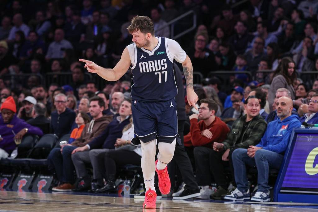 Feb 8, 2024; New York, New York, USA; Dallas Mavericks guard Luka Doncic (77) reacts after a basket against the New York Knicks during the second half at Madison Square Garden. Mandatory Credit: Vincent Carchietta-USA TODAY Sports