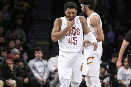 Feb 8, 2024; Brooklyn, New York, USA; Cleveland Cavaliers guard Donovan Mitchell (45) reacts after getting hit in the face in the fourth quarter against the Brooklyn Nets at Barclays Center. Mandatory Credit: Wendell Cruz-USA TODAY Sports
