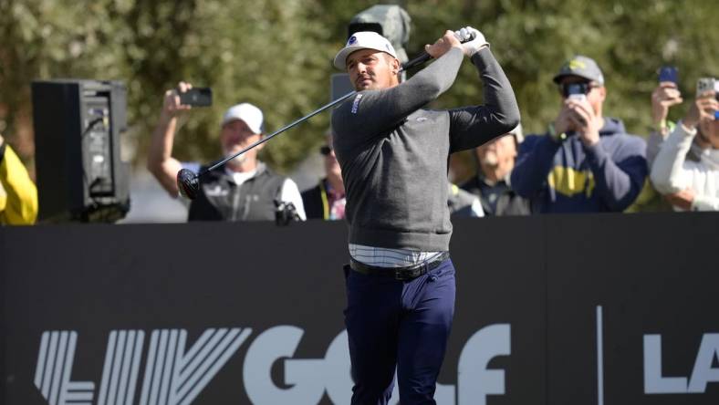 Feb 9, 2024; Las Vegas, Nevada, USA; Bryson DeChambeau plays his shot from the seventh tee during the second round of the LIV Golf Las Vegas tournament at Las Vegas Country Club. Mandatory Credit: Lucas Peltier-USA TODAY Sports