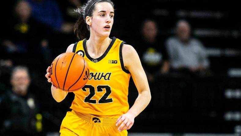 Iowa guard Caitlin Clark (22) takes the ball up court during a NCAA women's basketball exhibition game against Truman State, Thursday, Nov. 4, 2021, at Carver-Hawkeye Arena in Iowa City, Iowa.

211104 Iowa Truman St Wbb Ex 011 Jpg