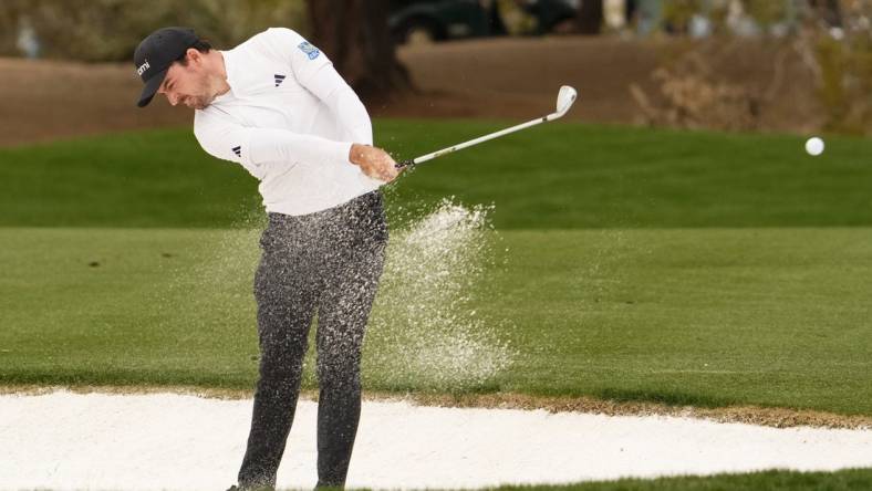 Nick Taylor plays his second from a bunker shot on the second hole during Round 2 at the WM Phoenix Open at TPC Scottsdale on Feb. 9, 2024.