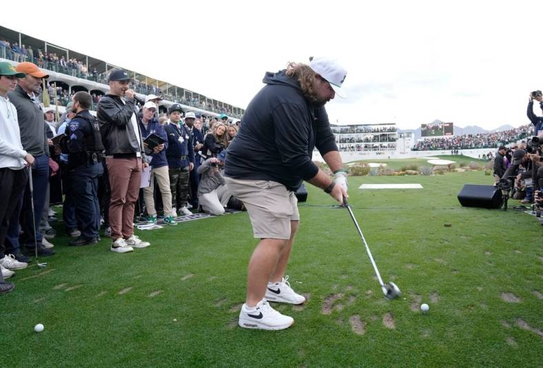 Fat Perez hits a shot during the WHOOP Shot at Glory on the 16th hole at TPC Scottsdale on Feb. 7, 2024.