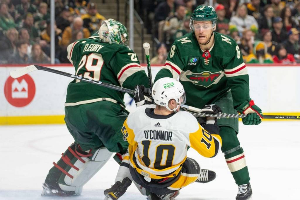 Feb 9, 2024; Saint Paul, Minnesota, USA; Minnesota Wild defenseman Dakota Mermis (6) is called for a penalty on Pittsburgh Penguins left wing Drew O'Connor (10) in the first period at Xcel Energy Center. Mandatory Credit: Matt Blewett-USA TODAY Sports