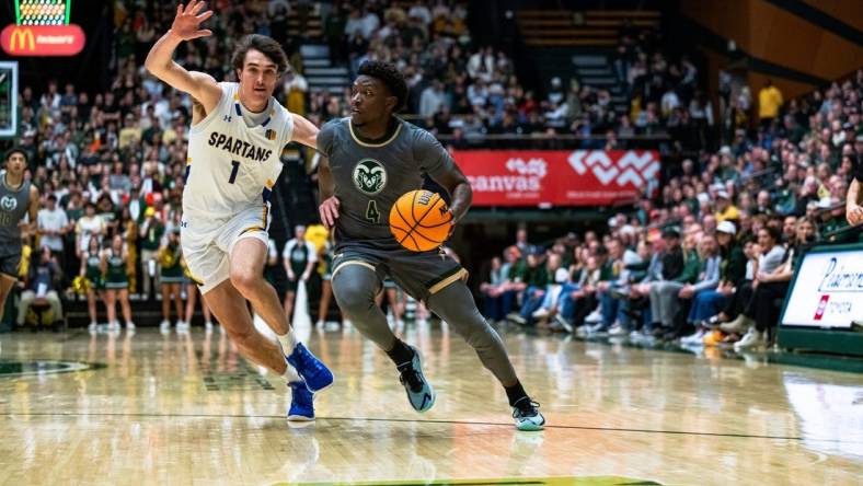 Colorado State University's 
 Isaiah Stevens (4) drives towards the basket during their game against San Jose State at Moby Arena on Friday, Feb. 9. Rams win 66-47.