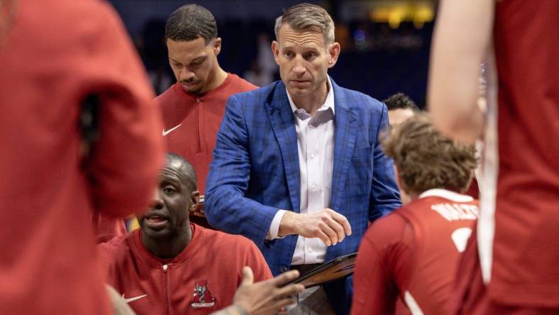 Feb 10, 2024; Baton Rouge, Louisiana, USA;  Alabama Crimson Tide head coach Nate Oats speaks to his players during a time out in the first half against the LSU Tigers at Pete Maravich Assembly Center. Mandatory Credit: Stephen Lew-USA TODAY Sports