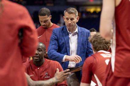 Feb 10, 2024; Baton Rouge, Louisiana, USA;  Alabama Crimson Tide head coach Nate Oats speaks to his players during a time out in the first half against the LSU Tigers at Pete Maravich Assembly Center. Mandatory Credit: Stephen Lew-USA TODAY Sports