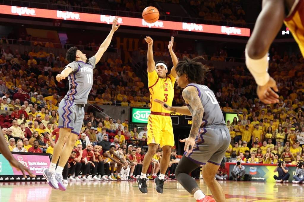 Feb 10, 2024; Ames, Iowa, USA; Iowa State Cyclones guard Tamin Lipsey (3) shoots over TCU Horned Frogs guard Trevian Tennyson (11) during the first half at James H. Hilton Coliseum. Mandatory Credit: Reese Strickland-USA TODAY Sports