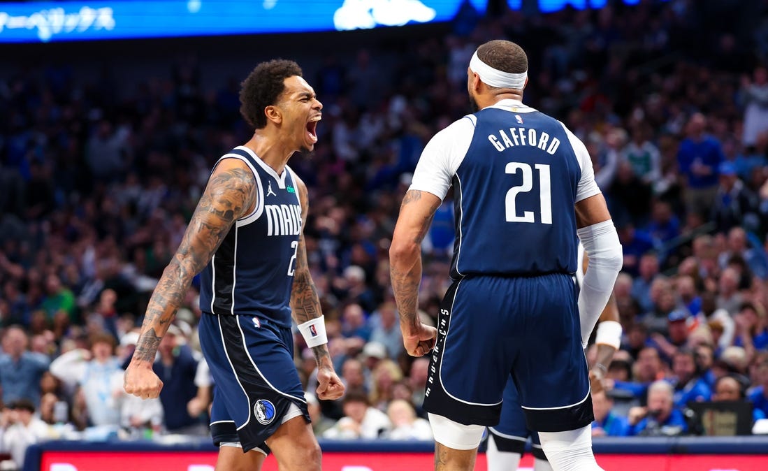 Feb 10, 2024; Dallas, Texas, USA; Dallas Mavericks forward P.J. Washington (25) celebrates with Dallas Mavericks center Daniel Gafford (21) during the second half against the Oklahoma City Thunder at American Airlines Center. Mandatory Credit: Kevin Jairaj-USA TODAY Sports