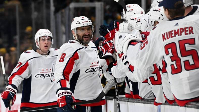 Feb 10, 2024; Boston, Massachusetts, USA; Washington Capitals left wing Alex Ovechkin (8) celebrates with his teammates after scoring a goal against the Boston Bruins during the third period at the TD Garden. Mandatory Credit: Brian Fluharty-USA TODAY Sports