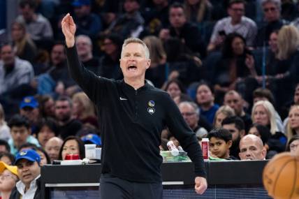 Feb 10, 2024; San Francisco, California, USA; Golden State Warriors head coach Steve Kerr reacts during the first half of the game against the Phoenix Sunsat Chase Center. Mandatory Credit: John Hefti-USA TODAY Sports